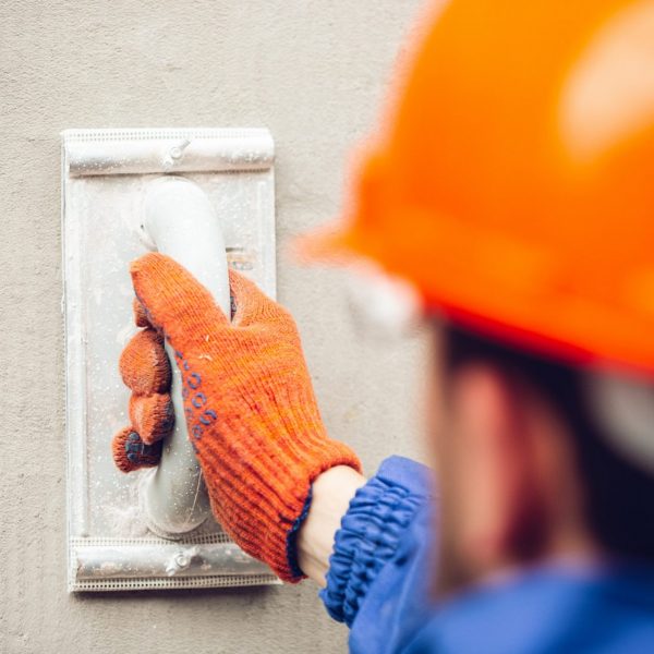 close-up-hand-repairman-professional-builder-working-indoors-repairing close-up-hand-repairman-professional-builder-working-indoors-repairing